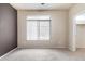 Comfortable bedroom with neutral tones, carpet, and natural lighting from the window at 900 S 94Th St # 1203, Chandler, AZ 85224