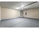 Spacious garage with epoxy flooring, water heater, and plenty of storage at 900 S 94Th St # 1203, Chandler, AZ 85224