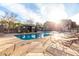 Sparkling community pool area with lounge chairs, a gazebo, and a water feature for relaxation and enjoyment at 900 S 94Th St # 1203, Chandler, AZ 85224