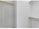 A walk-in closet features ample shelving and storage options for organizing clothes and accessories at 900 S 94Th St # 1203, Chandler, AZ 85224
