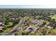 Aerial view of the community showcasing lush green spaces, tennis courts, and residential homes at 9445 S La Rosa Dr, Tempe, AZ 85284