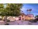 Charming single-story home with a well-manicured lawn, tile roof, and attached two-car garage at 9445 S La Rosa Dr, Tempe, AZ 85284
