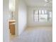 Main bedroom featuring large window, tile flooring, and an en-suite bathroom with a separate shower at 9445 S La Rosa Dr, Tempe, AZ 85284