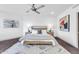 Bright bedroom with recessed lighting, hardwood floors, and city views is tastefully decorated at 1040 E Osborn Rd # 1004, Phoenix, AZ 85014