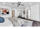 Comfortable bedroom with clean, white walls and hardwood floors offers access to a walk-in closet at 1040 E Osborn Rd # 1004, Phoenix, AZ 85014