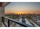 Scenic sunset view overlooking the city skyline and a golf course from a high-rise balcony at 1040 E Osborn Rd # 1004, Phoenix, AZ 85014