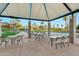 Covered community pavilion with outdoor seating and a view of the pool at 1040 E Osborn Rd # 1004, Phoenix, AZ 85014