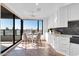 Bright dining area offers bar seating, modern fixtures, and fantastic city views at 1040 E Osborn Rd # 1004, Phoenix, AZ 85014