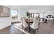 Elegant dining area with seating for six, abundant natural light, and a seamless transition to the living space at 1040 E Osborn Rd # 1004, Phoenix, AZ 85014