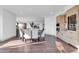 Open concept dining room with modern built-ins, seating for six, and easy access to the kitchen at 1040 E Osborn Rd # 1004, Phoenix, AZ 85014