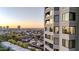 Modern high-rise exterior with balconies offering expansive views of the city and neighborhood at 1040 E Osborn Rd # 1004, Phoenix, AZ 85014