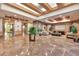 Large lobby area featuring marble flooring, decorative ceiling, plants and seating at 1040 E Osborn Rd # 1004, Phoenix, AZ 85014