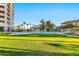 Pool featuring a covered seating area and lush landscaping at 1040 E Osborn Rd # 1004, Phoenix, AZ 85014