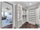 A luxurious walk-in closet featuring plenty of shelving and storage for all your clothing needs at 1040 E Osborn Rd # 1004, Phoenix, AZ 85014