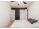 Bedroom featuring closet, ceiling fan and neutral tones to create a relaxing atmosphere at 1051 S Dobson Rd # 137, Mesa, AZ 85202