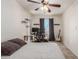Bedroom featuring closet, ceiling fan, desk/work space and neutral tones to create a relaxing atmosphere at 1051 S Dobson Rd # 137, Mesa, AZ 85202