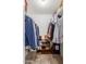 Walk in closet featuring clothes and shoe racks providing ample storage space at 1051 S Dobson Rd # 137, Mesa, AZ 85202