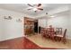 Dining room with hardwood floors and a view of the kitchen bar at 1051 S Dobson Rd # 137, Mesa, AZ 85202