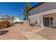 Charming home featuring a textured exterior, lush greenery, and well-maintained landscaping at 1051 S Dobson Rd # 137, Mesa, AZ 85202