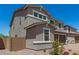 Well-maintained two-story home featuring a two-car garage and landscaped front yard at 11615 W Beck Ave, Youngtown, AZ 85363