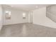 Spacious living room features tile floors, recessed lighting, and a staircase at 11615 W Beck Ave, Youngtown, AZ 85363