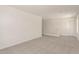 Upstairs loft with carpet, white walls, recessed lighting, and a door to another room at 11615 W Beck Ave, Youngtown, AZ 85363
