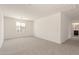 Upstairs loft with carpet, white walls, recessed lighting, and a window at 11615 W Beck Ave, Youngtown, AZ 85363