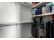 Organized walk-in closet featuring shelving for storage solutions, maximizing space at 11640 N Tatum Blvd # 3048, Phoenix, AZ 85028
