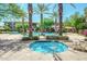 Resort-style community pool and spa surrounded by lush landscaping and palm trees for ultimate relaxation at 11640 N Tatum Blvd # 3048, Phoenix, AZ 85028