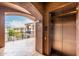 Convenient elevator access with a stylish tile entry to the condo building at 11640 N Tatum Blvd # 3048, Phoenix, AZ 85028