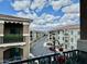Street view of condo community with well-maintained landscaping and multiple units at 11640 N Tatum Blvd # 3048, Phoenix, AZ 85028