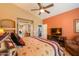 Primary bedroom featuring an open closet and terracotta walls at 123 S Lucia Ln, Casa Grande, AZ 85194