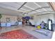 Spacious garage with utility sink, and organization racks at 123 S Lucia Ln, Casa Grande, AZ 85194