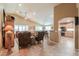 Spacious living room featuring high ceilings, tile floors, and comfortable seating and open floor plan at 123 S Lucia Ln, Casa Grande, AZ 85194