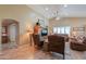Spacious living room featuring high ceilings, tile floors, and comfortable seating and open floor plan at 123 S Lucia Ln, Casa Grande, AZ 85194