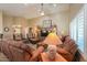 Cozy living room with comfortable seating, neutral color palette, and lots of natural light at 123 S Lucia Ln, Casa Grande, AZ 85194