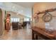 Open concept living room with high ceilings, tile flooring, and lots of natural light and modern decor at 123 S Lucia Ln, Casa Grande, AZ 85194