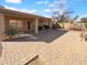 This outdoor space features a covered patio and a paved area perfect for relaxing or entertaining at 12914 W Wilshire Dr, Avondale, AZ 85392