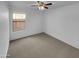 Bedroom featuring neutral carpet and a window at 12914 W Wilshire Dr, Avondale, AZ 85392