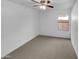 Bedroom featuring neutral carpet and a window at 12914 W Wilshire Dr, Avondale, AZ 85392