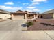 Charming single-story home featuring a two-car garage, well-kept landscaping, and a cozy entrance at 12914 W Wilshire Dr, Avondale, AZ 85392