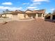 Charming single-story home featuring a two-car garage, well-kept landscaping, and solar panels at 12914 W Wilshire Dr, Avondale, AZ 85392