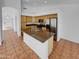 Well-equipped kitchen with center island, stainless steel appliances, and ample cabinet space at 12914 W Wilshire Dr, Avondale, AZ 85392