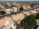 Panoramic aerial view of the residential neighborhood, featuring tile roofs and mature trees at 1313 W Straford Ave, Gilbert, AZ 85233