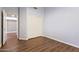 Bedroom with wood floors and closet at 1313 W Straford Ave, Gilbert, AZ 85233
