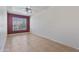 Bedroom with tile floors, ceiling fan, and window at 1313 W Straford Ave, Gilbert, AZ 85233