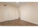 Spacious bedroom featuring wood floors and ample closet space at 1313 W Straford Ave, Gilbert, AZ 85233
