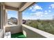Balcony showcasing beautiful mountain views, synthetic grass and comfortable seating area at 13662 E Shaw Butte Dr, Scottsdale, AZ 85259