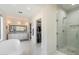 Bright bathroom featuring marble floors, double vanity, and a large glass-enclosed shower at 13662 E Shaw Butte Dr, Scottsdale, AZ 85259