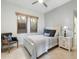 Cozy bedroom with neutral color, featuring a comfortable chair and bedside tables at 13662 E Shaw Butte Dr, Scottsdale, AZ 85259